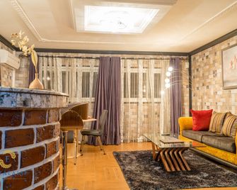 أوتل ريزيدنس لا فالايس - دوالا - غرفة معيشة