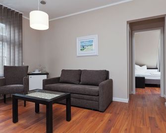 Hotel Küstenklang - Carolinensiel - Obývací pokoj