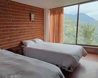 Casa de Campo El Descanso - Baños - Makuuhuone