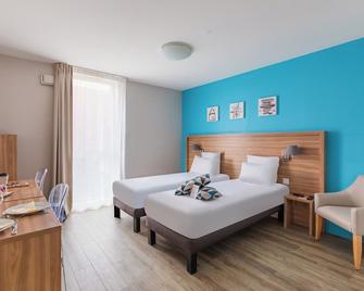 Appart'City Confort Vannes - ואן - חדר שינה