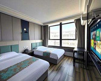 Lanzhou Pandora Art Hotel - Lanzhou - Slaapkamer