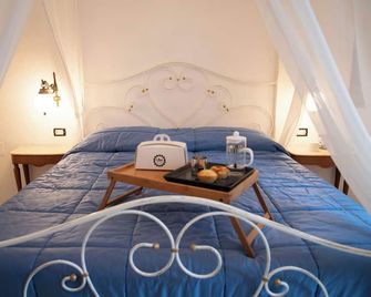 B&B Visìtaexperience - 토레 산타 수산나 - 침실