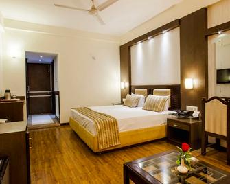 Hotel Shiva Continental - Mussoorie - Camera da letto