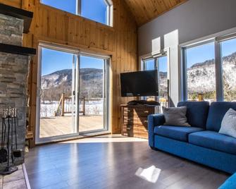Les Chalets Tourisma - Chalet avec spa et foyer - Du Cap - St-Raymond - Sala de estar