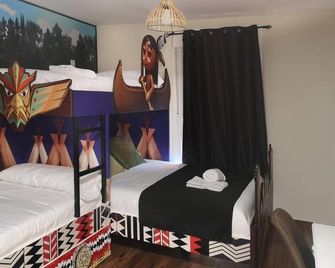 El Indio Chocolateria Boutique Hostel - Pinto - Habitación
