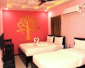 Temple stay - Uma Residency and Guest House - Mayiladuthurai - Habitación