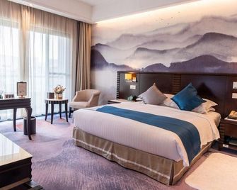 Xiang Ming Luxury Airport Hotel - הואנגשאן - חדר שינה