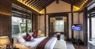 Yurun Hanyuelou Villa Resort Huangshan - Huangshan - Camera da letto