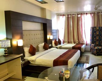 The Wallflower Hotel - Kota - Schlafzimmer