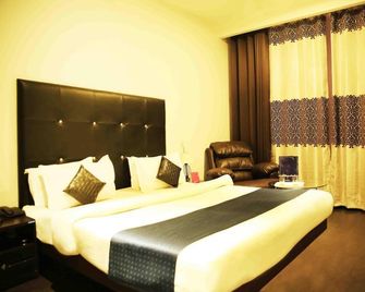 Hotel Orbion Mall Road - אמריצר - חדר שינה
