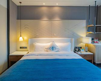 Shunshine International Hotel Xiangxi - Xiangxi - Bedroom
