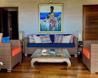Moorea-Maiao, Windward Islands - Villa Te Maka, lagoon view, jacuzzi, AC, Fiber - Papetoai - Living room