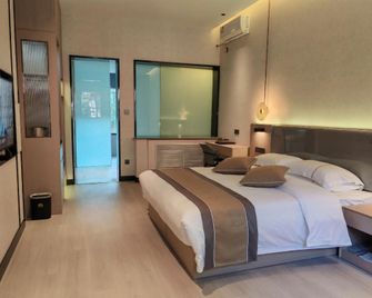 Guanzhong Folk Customs Hot Spring Hotel - Baoji - Slaapkamer