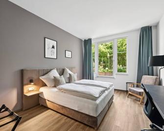 هوم آند كوليفينج بون أبارت هوتل - بون - غرفة نوم