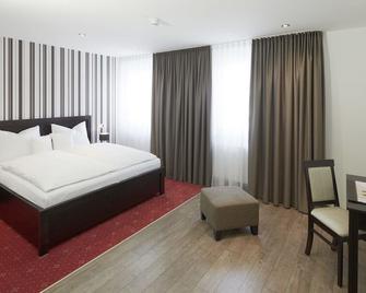 Limes Hotel - Wehrheim - Ložnice