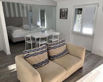 Locarno Centro Apartments - Locarno - Living room