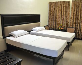 Trivandrum Hotel - טריבאנדרום - חדר שינה
