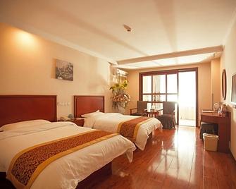 Greentree Inn Lianyungang Guanyun Bus Station Zhenxing Garden Express Hotel - Lianyungang - Bedroom