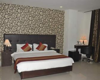 Hotel Patliputra Nirvana - Patna - Bedroom