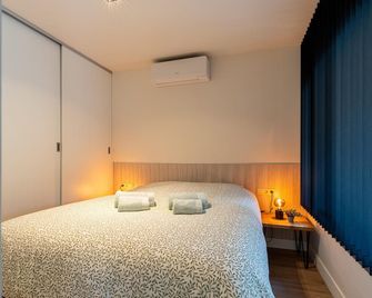 Beautiful holiday home in the middle of the woods - Zutendaal - Bedroom