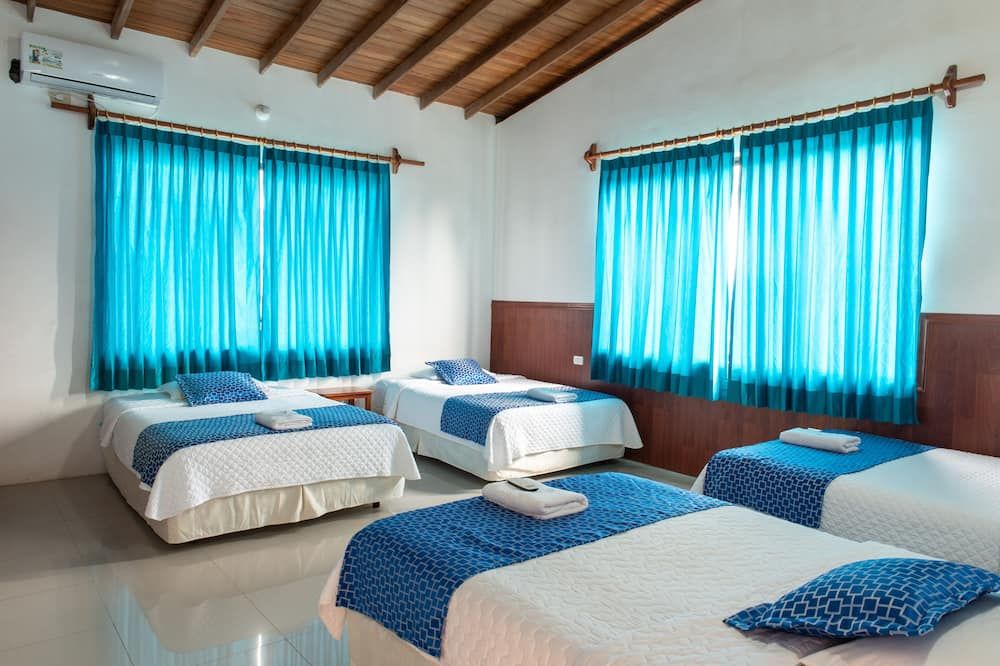 Hotel La Gran Tortuga - Puerto Villamil - Camera da letto