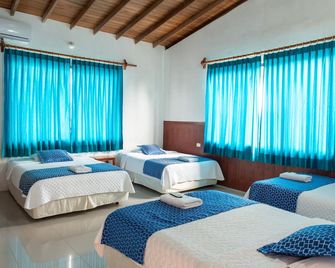 Hotel La Gran Tortuga - Puerto Villamil - Schlafzimmer