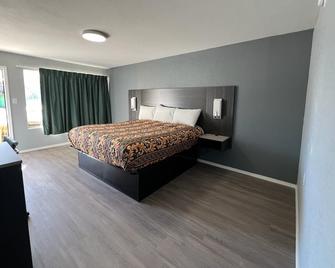 Pioneer Inn - Arkadelphia - Schlafzimmer