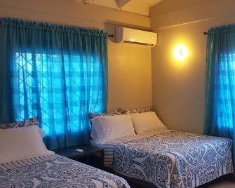 Relaxing, private, family friendly, 3 bedroom home - Couva - Habitación