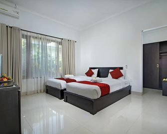 The Brothers Villa - South Kuta - חדר שינה