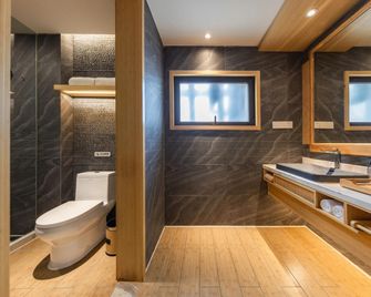 Jianguo Hidden Hotel Qufu Tourist Center - Jining - Schlafzimmer