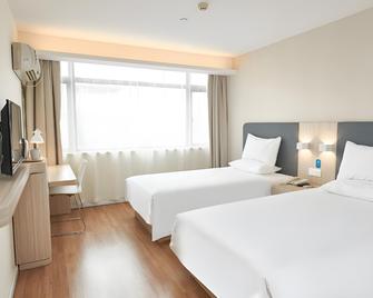 Hanting Hotel Urumqi Ergong Stadium - Ürümqi - Habitación