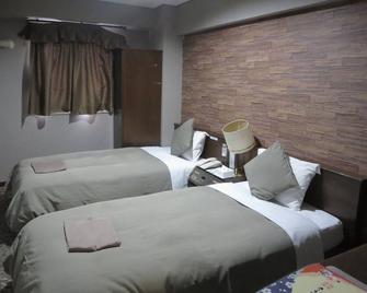 Hotel Rumieru Hyuga - Hyuga - Bedroom