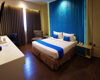 Zenith Hotel - Kendari - Bedroom