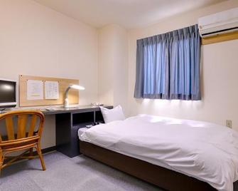Station Hotel Hayato - Kirishima - Спальня