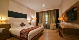 Narayani Heights Hotel and Resort - Gandhinagar - Bedroom