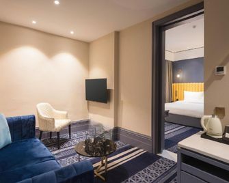 Guangzhou Gangrun East Asia Hotel - Guangzhou - Sala de estar