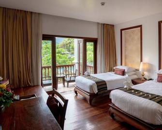 Le Palais Juliana - לואנג פראבאנג - חדר שינה