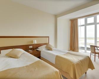 Gala Hotel Surgut - 蘇爾古特 - 臥室