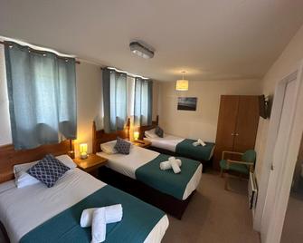 OYO Mackay's Spa Lodge Hotel - Strathpeffer - Спальня