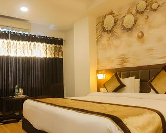 Solitaire Hotel And Resorts - Ujjain - Bedroom