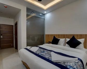 Townhouse Grand Address Hotel And Banquet - Ghaziabad - Schlafzimmer