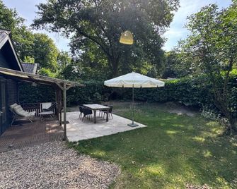 Prachtig huisje met grote tuin op de Veluwe - Vaassen - Binnenhof