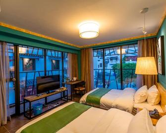 Moon Flower Hotel - Guilin - Bedroom