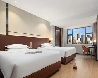 Yzhi Hotel - Guangzhou Panyu City Bridge Subway Station - Canton - Camera da letto