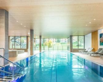 Apartment Pradas Resort - 2-5 Zimmer Premium by Interhome - Breil/Brigels - Pool