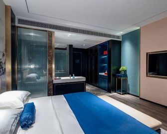 Happy Chain Hotel (Huainan Stadium Zhenxuan) - Huainan - Bedroom