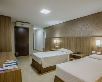 Foz Presidente Comfort Hotel - פוז דו איגוואסו - חדר שינה