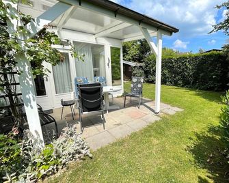 Rustig gelegen vakantiebungalow - Kortgene - Патіо