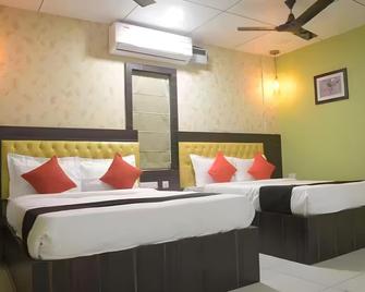 Goroomgo Hotel Srikhetra Swargadwar - Puri - Slaapkamer