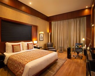 Gokulam Grand Hotel & Spa Bangalore - Bangalore - Kamar Tidur